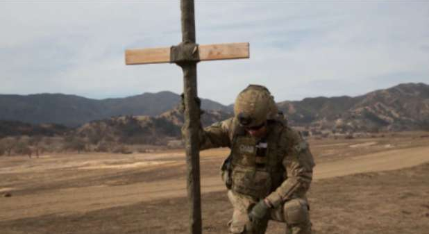 Christian soldier at cross