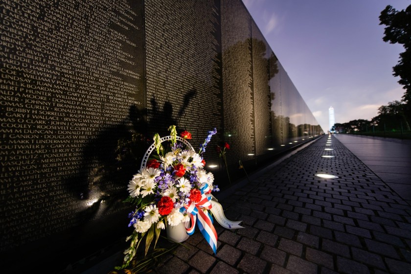 Vietnam Veteran's Memorial with Bouquet and Washington Monument